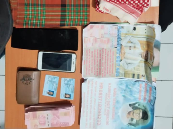 Barang bukti uang palsu 